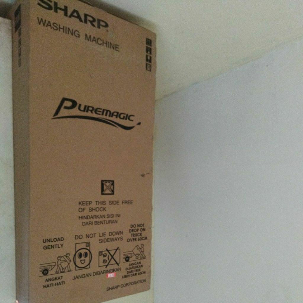 kardus bekas mesin cuci sharp