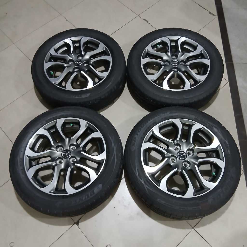 VELG STD MAZDA R16X6,5 4X100 ET 50 G/P + DLP 185 60 R16 KONDISI BEKAS.