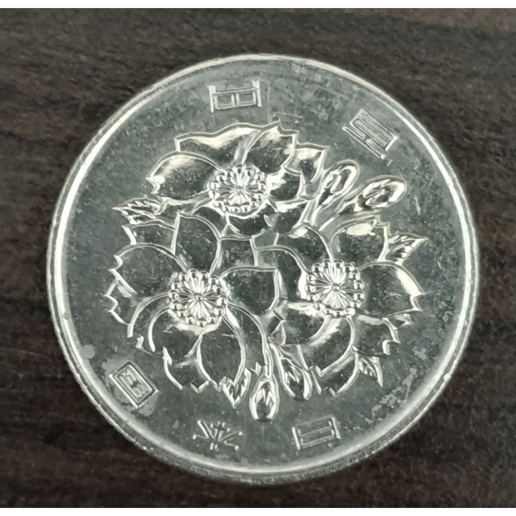koin Jepang 100 yen tahun campur..