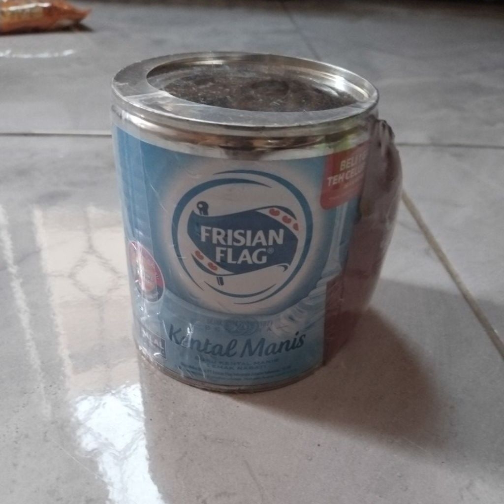 

Susu kaleng Frisian flag berhadiah teh celup