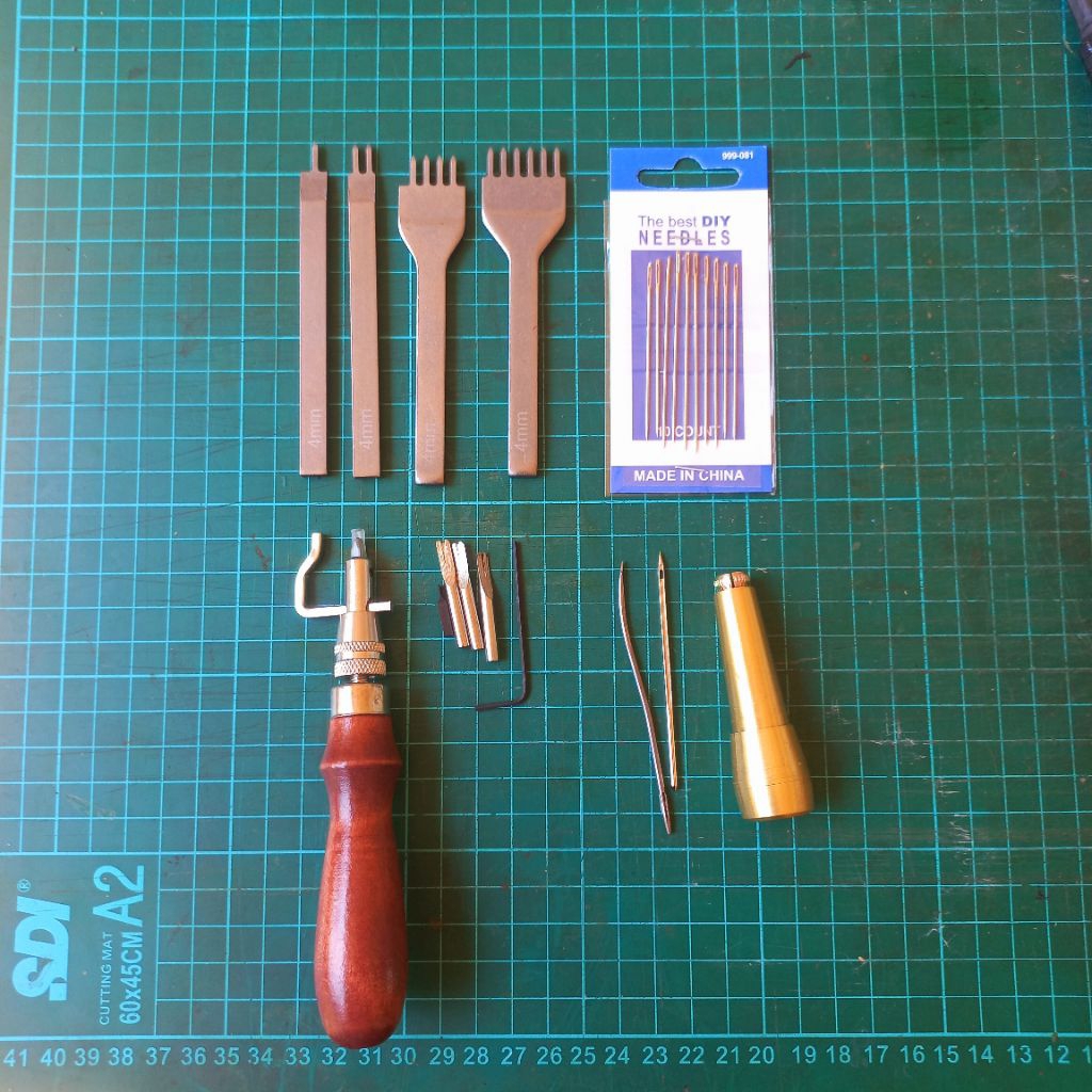 

4pcs Set Awl Prong Groover Jarum Leather Craft Tool Stitching Punch Hole