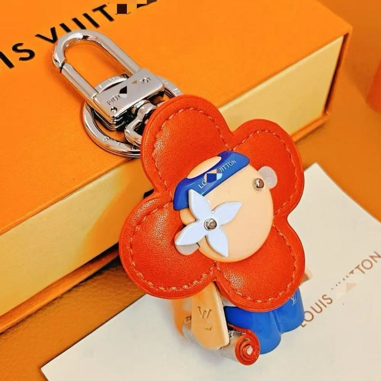 BANTING HARGA gantungan kunci aksesoris kualitas premium tas L5V vivien model bunga matahari bahan l