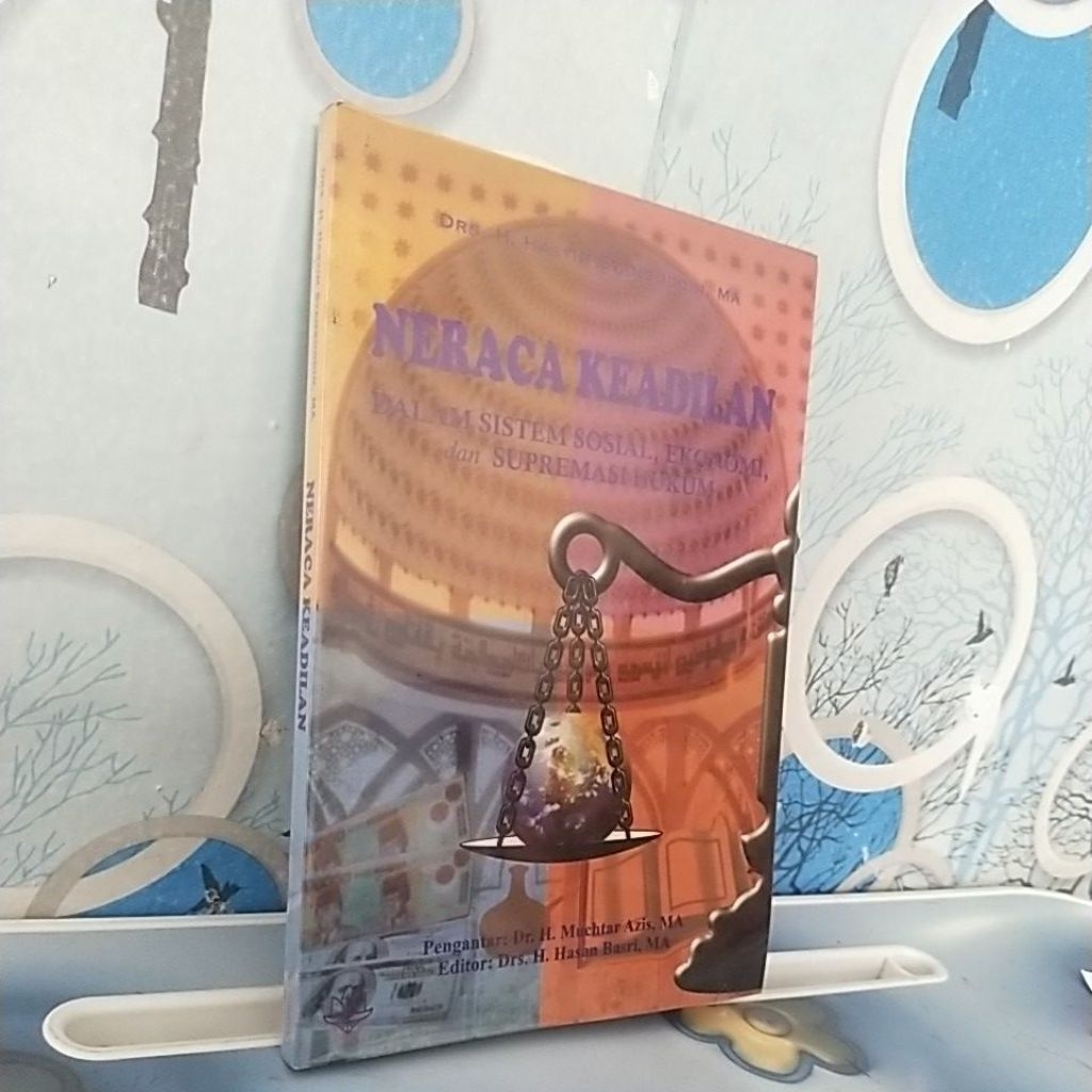 NERACA KEADILAN DALAM SISTEM SOSIAL, EKONOMI,DAN SUPREMASI HUKUM