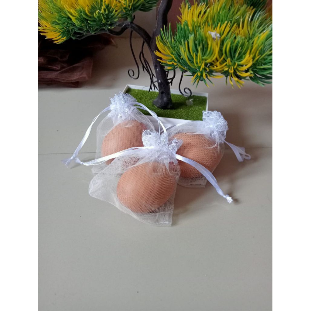 

Kantong tile souvenir untuk telur dll. ukuran 8x8cm isi 25pcs