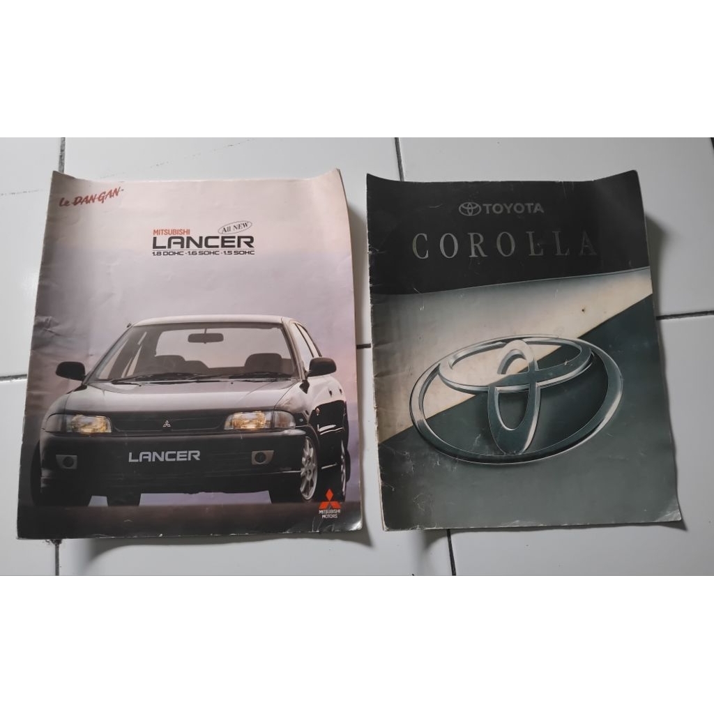 2 Brosur Mitsubishi Lancer & Toyota Corola