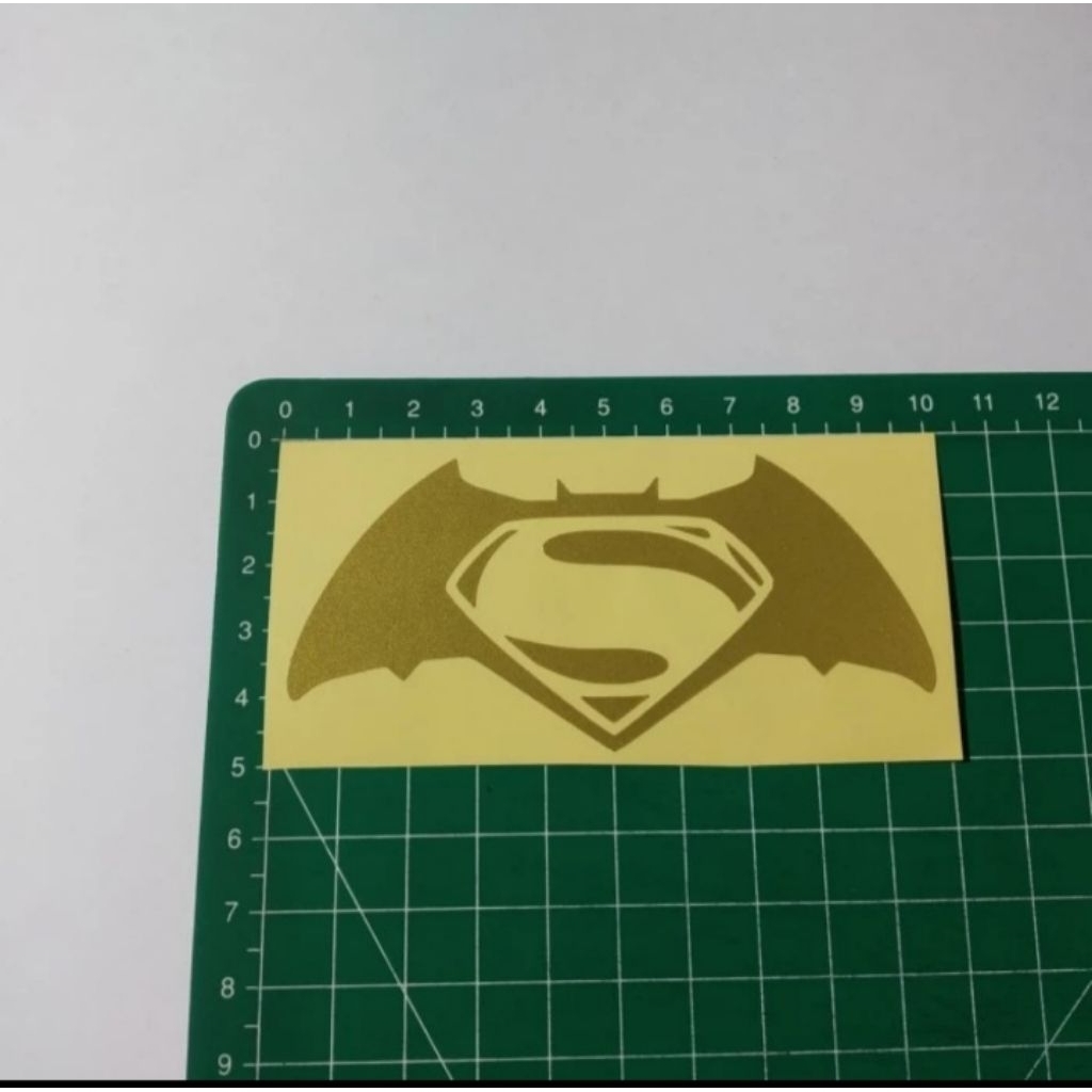 

stiker cutting superman batman
