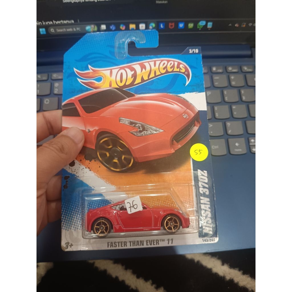 Hotwheels Nissan 370z faster than ever merah