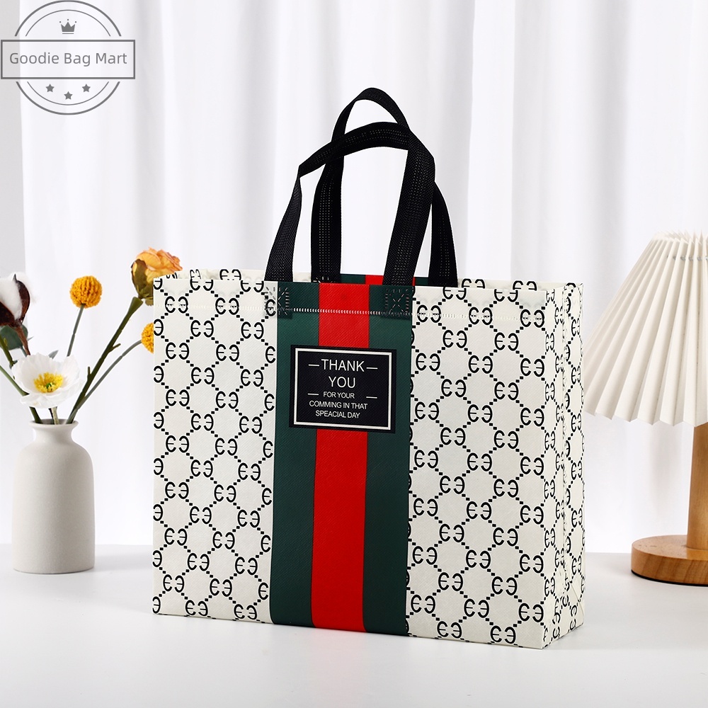 

Membentuk-A58/Goodie bag-Tas Belanja tas Jinjing tas spunbond tas souvenir premium tebal dan kuat/Terlaris lipat jumbo/ waterproof/shopping bag Tas Belanja Murah Karakter Kartun