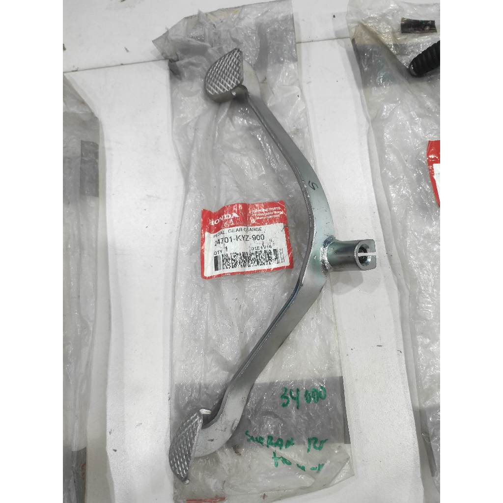 operan gigi supra x125 helm in ori