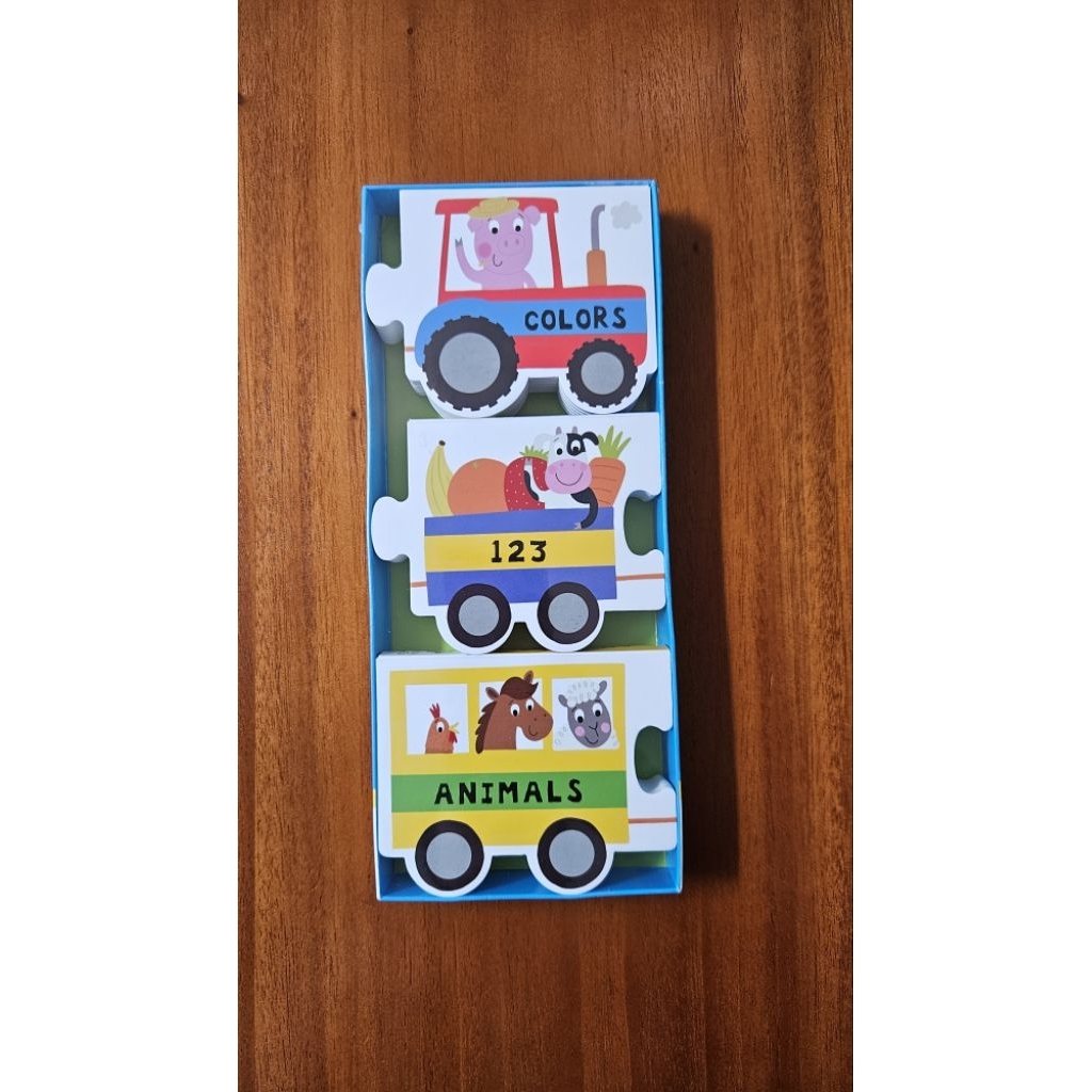 Priddy books puzzle. Play tractor