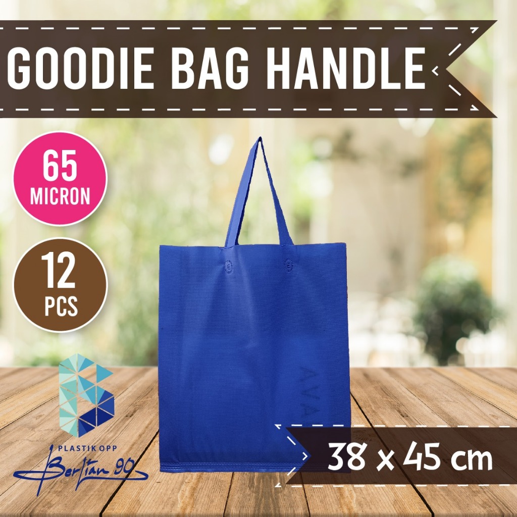 

Tas Spunbond uk 38x45 cm Isi 12 Pcs Tebal 65 gsm / Goodie Bag 38 x 45