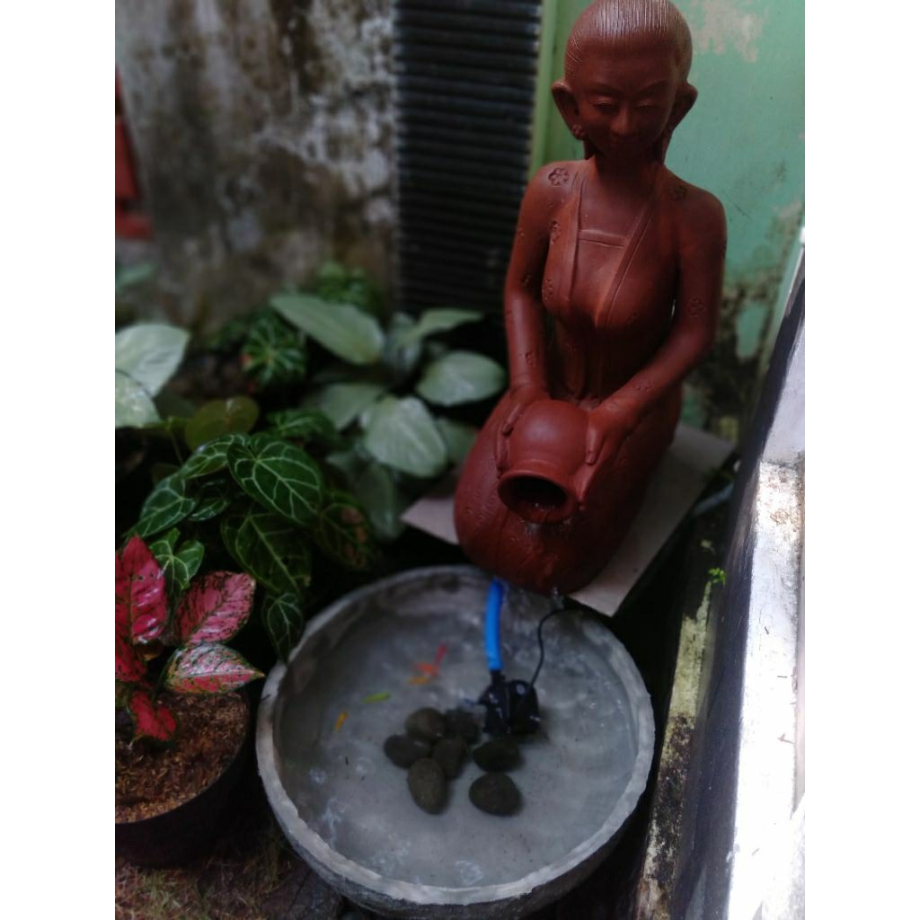 Patung simbok_patung air mancur simbok jamu_patung saja