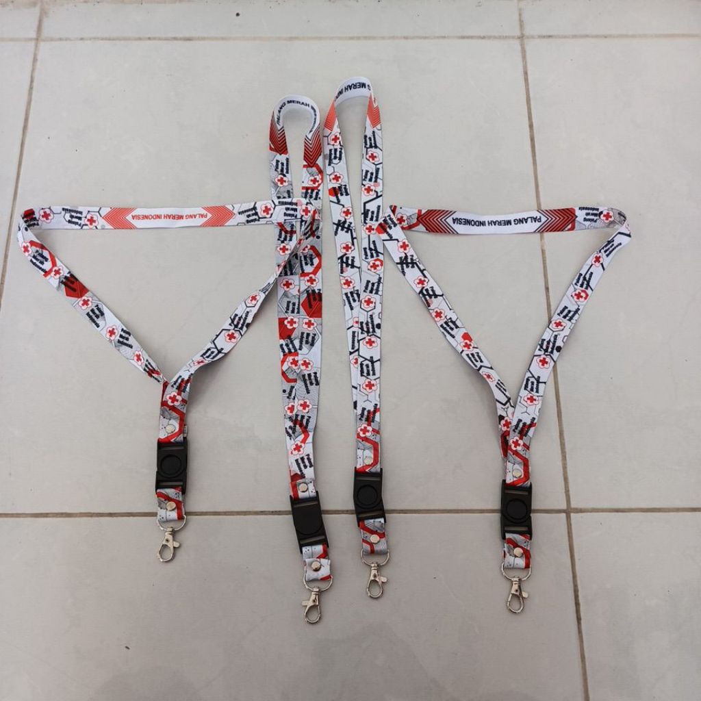 

TALI LANYARD ID CARD 2 CM 2 SISI PMI DESAIN 21