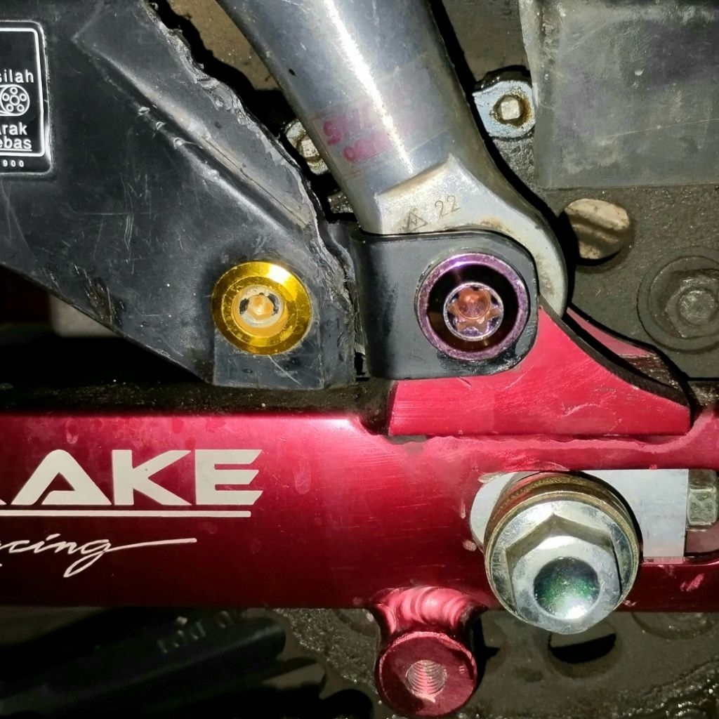 Breket tutup rantai arm drake supertrack supra x 125