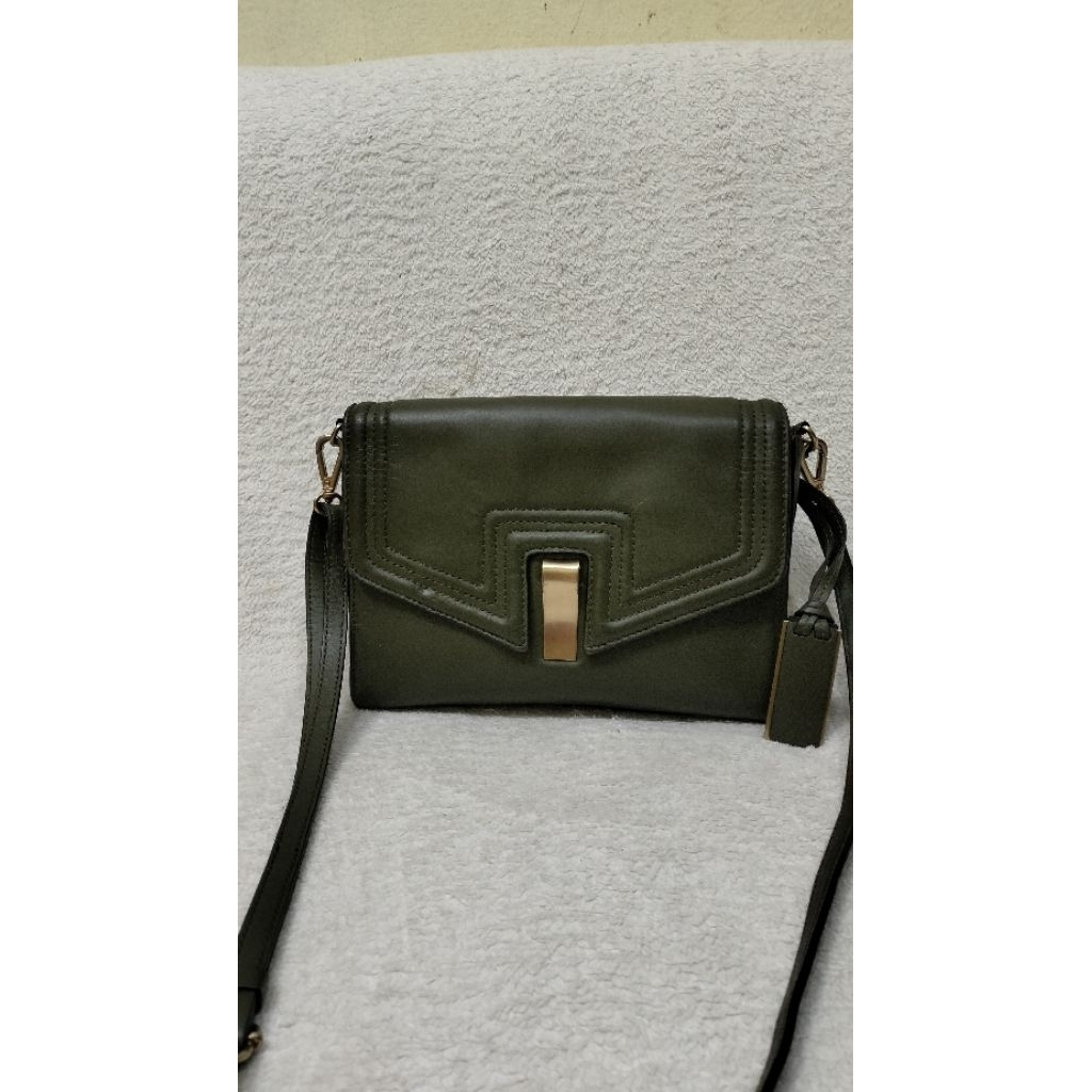 sling kulit joy gryson