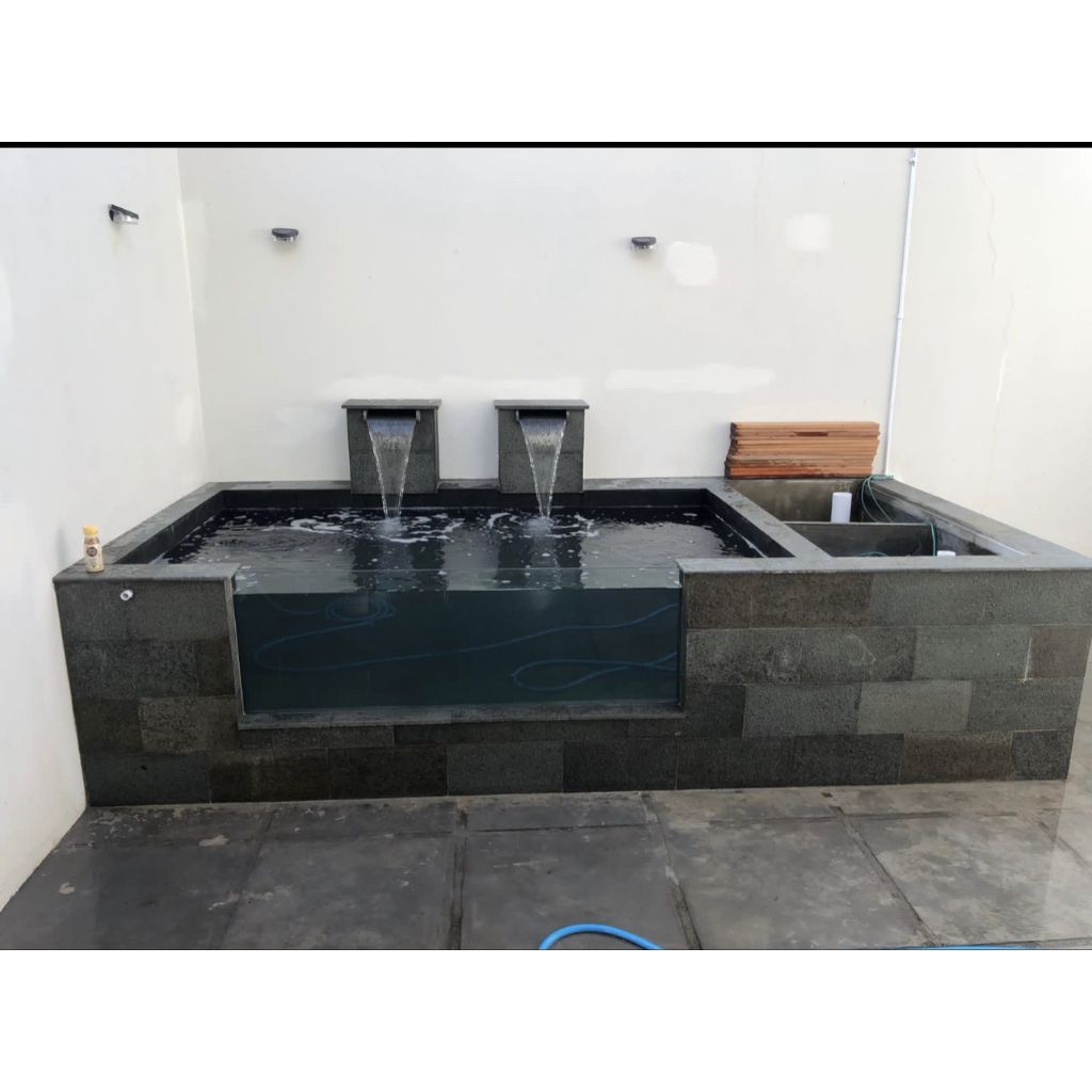 kolam koi minimalis air mancur