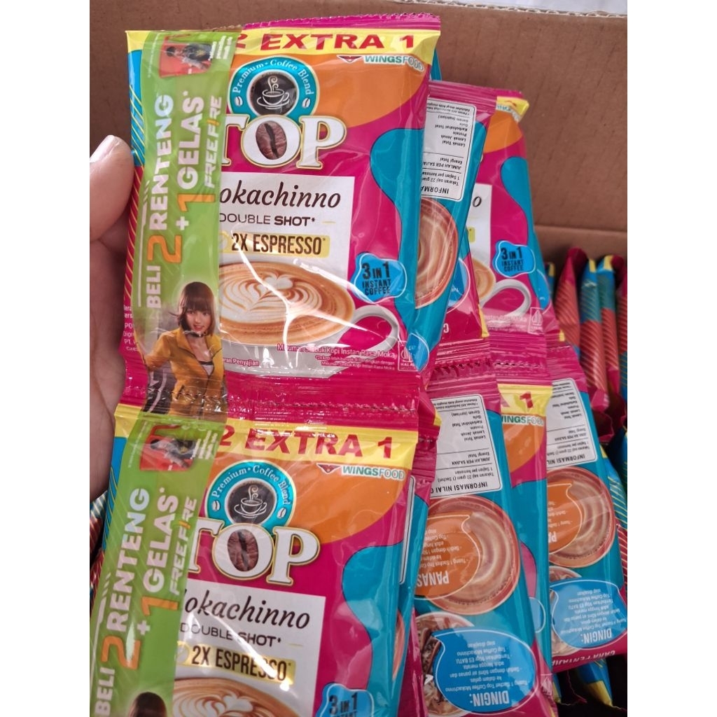 

Kopi TOP mokachinno1renteng isi 15 sachet