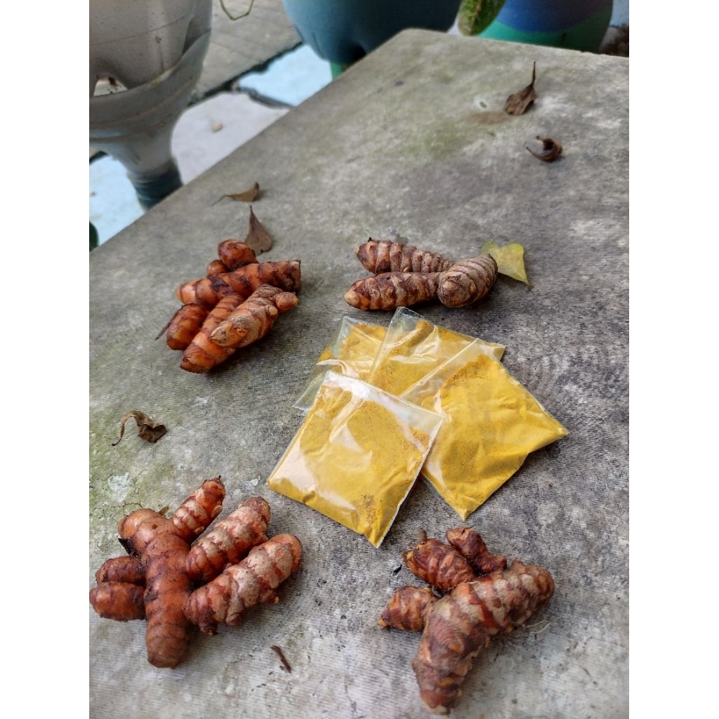 

kunyit bubuk + gula ( bisa langsung di seduh)