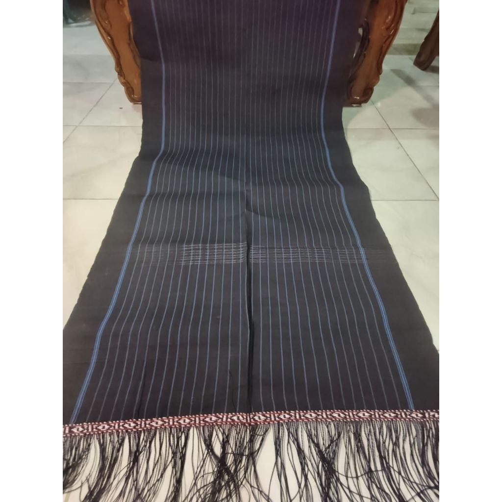 Ulos suri suri ganjang pakaian adat Batak toba