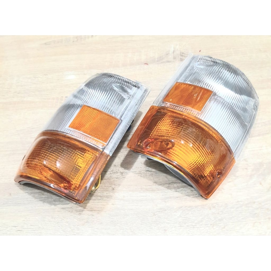 LAMPU SEN DEPAN/SEN ASSY FRONT ISUZU ELF NKR.66, NKR 58 PER SET(KANAN+KIRI)