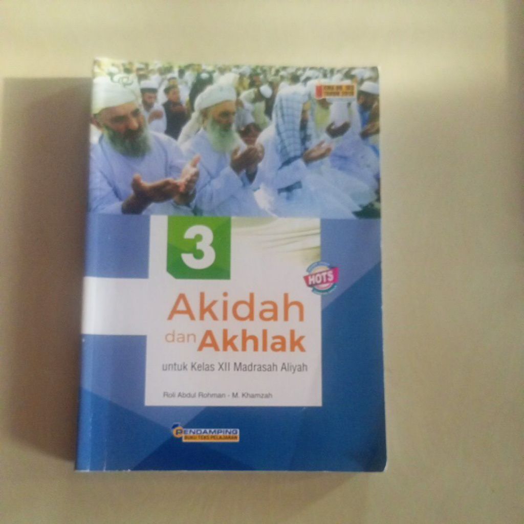 AKIDAH AKHLAK KELAS 12 TIGA SERANGKAI