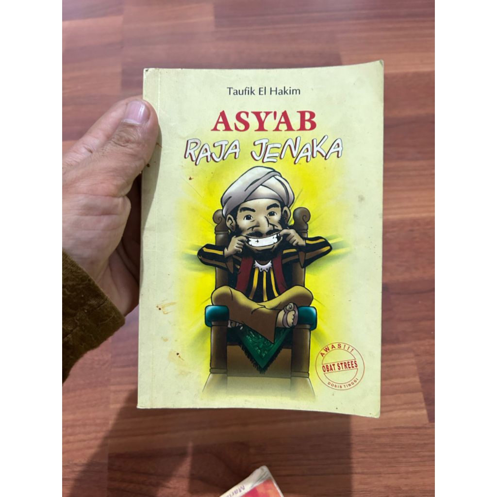 Buku cerita ASY'AB Raja neraka oleh Taufik El Hakim