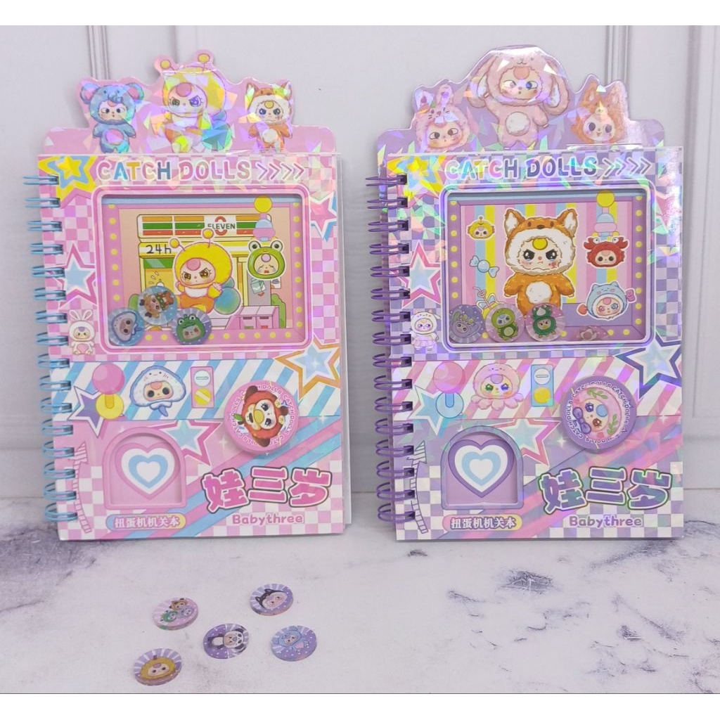 

Buku note mesin gashapon baby three