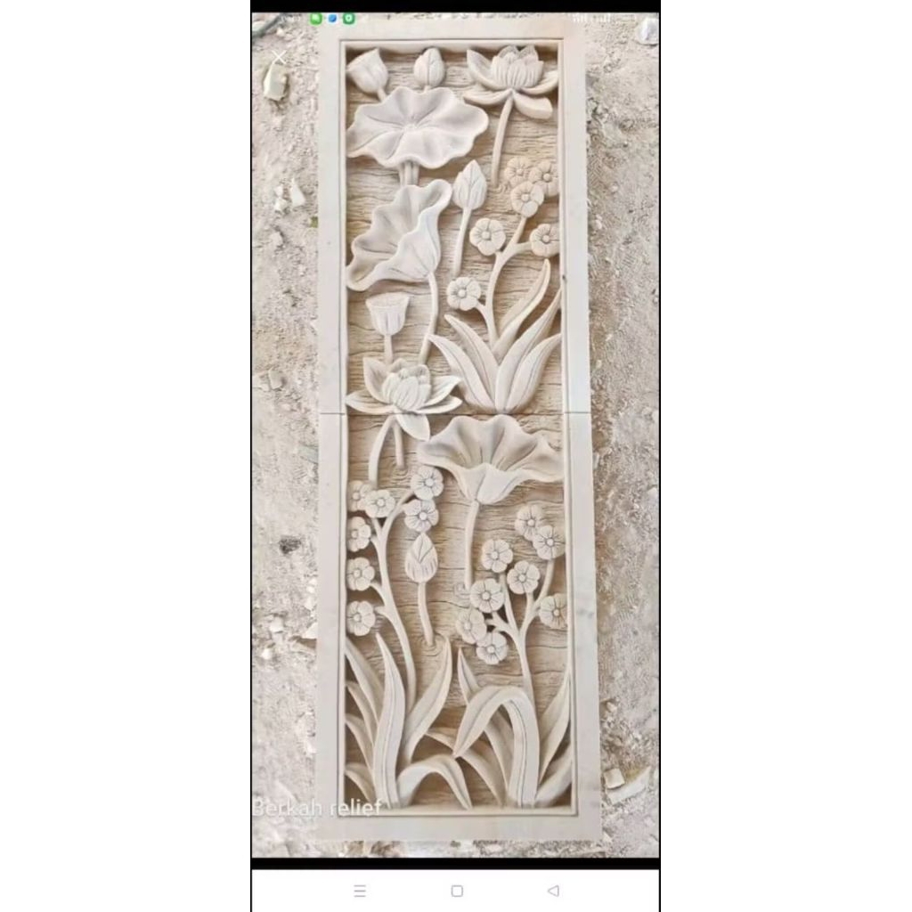 relief batu paras motif bunga dan tumbuhan