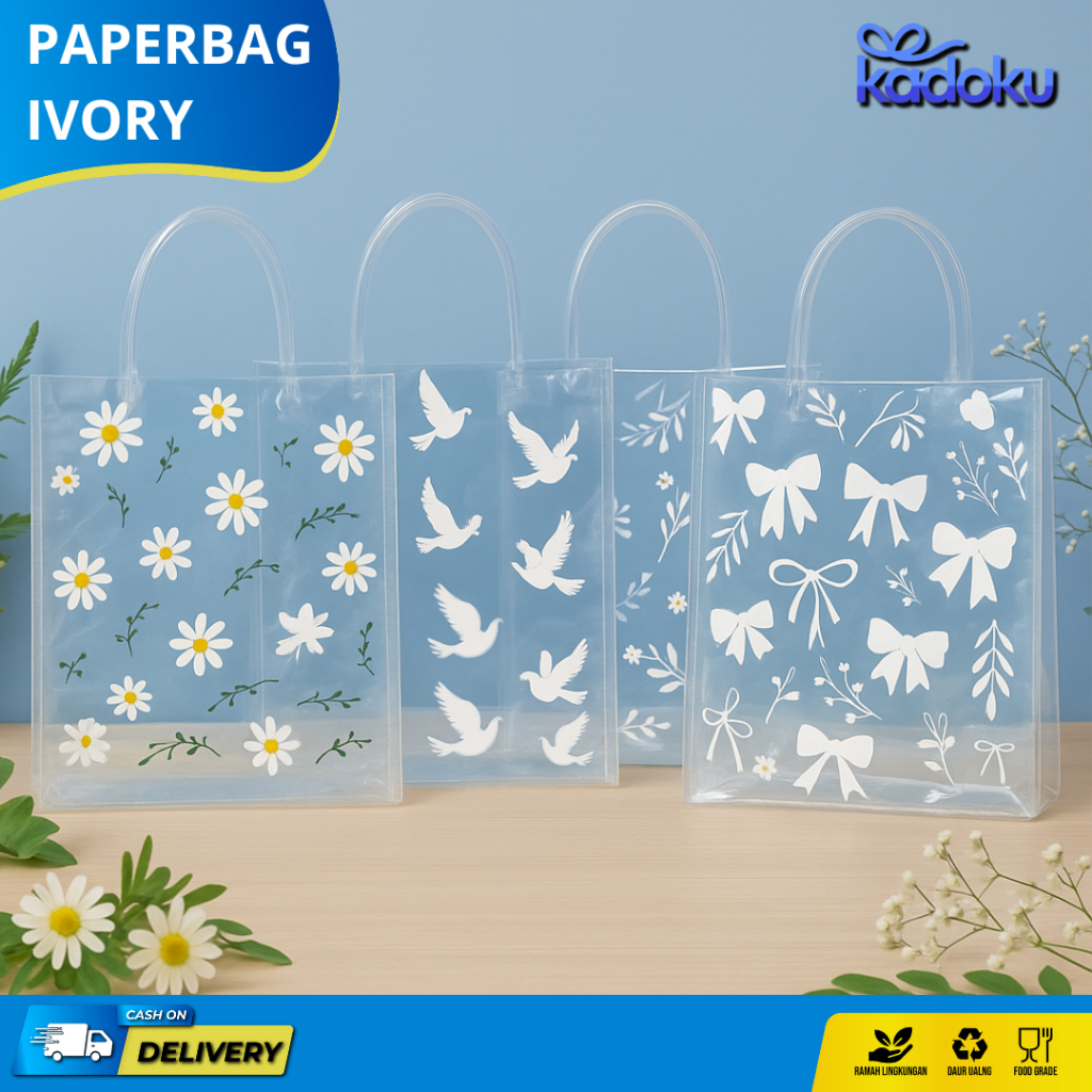 

Tas Mika PVC / Tas Mika PVC Transparan / Tas Bening / Tas Transparan / Tas Hampers Motif Pita Bunga