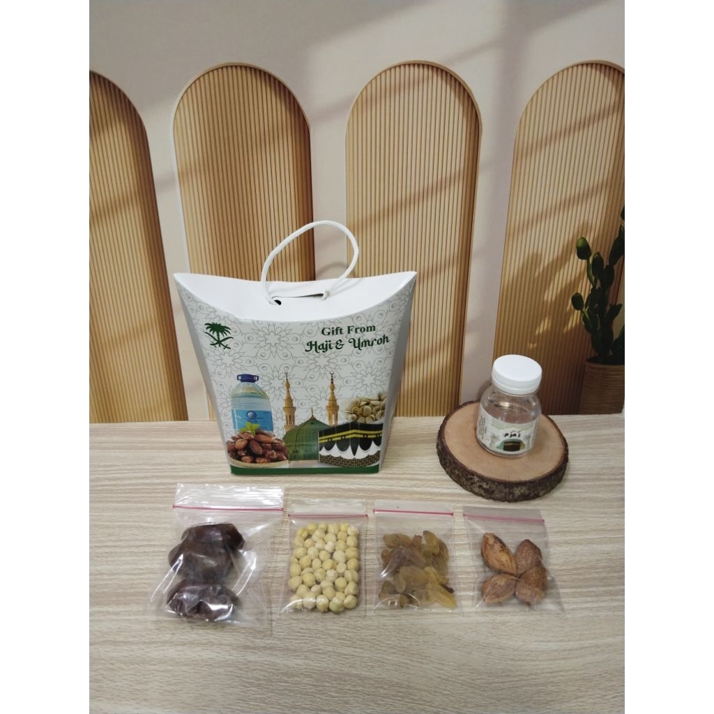 

Paket Oleh-Oleh Haji dan Umroh Almond /paket dus tenteng ( Paket H) Hampers makanan khas Arab Satuan/pcs