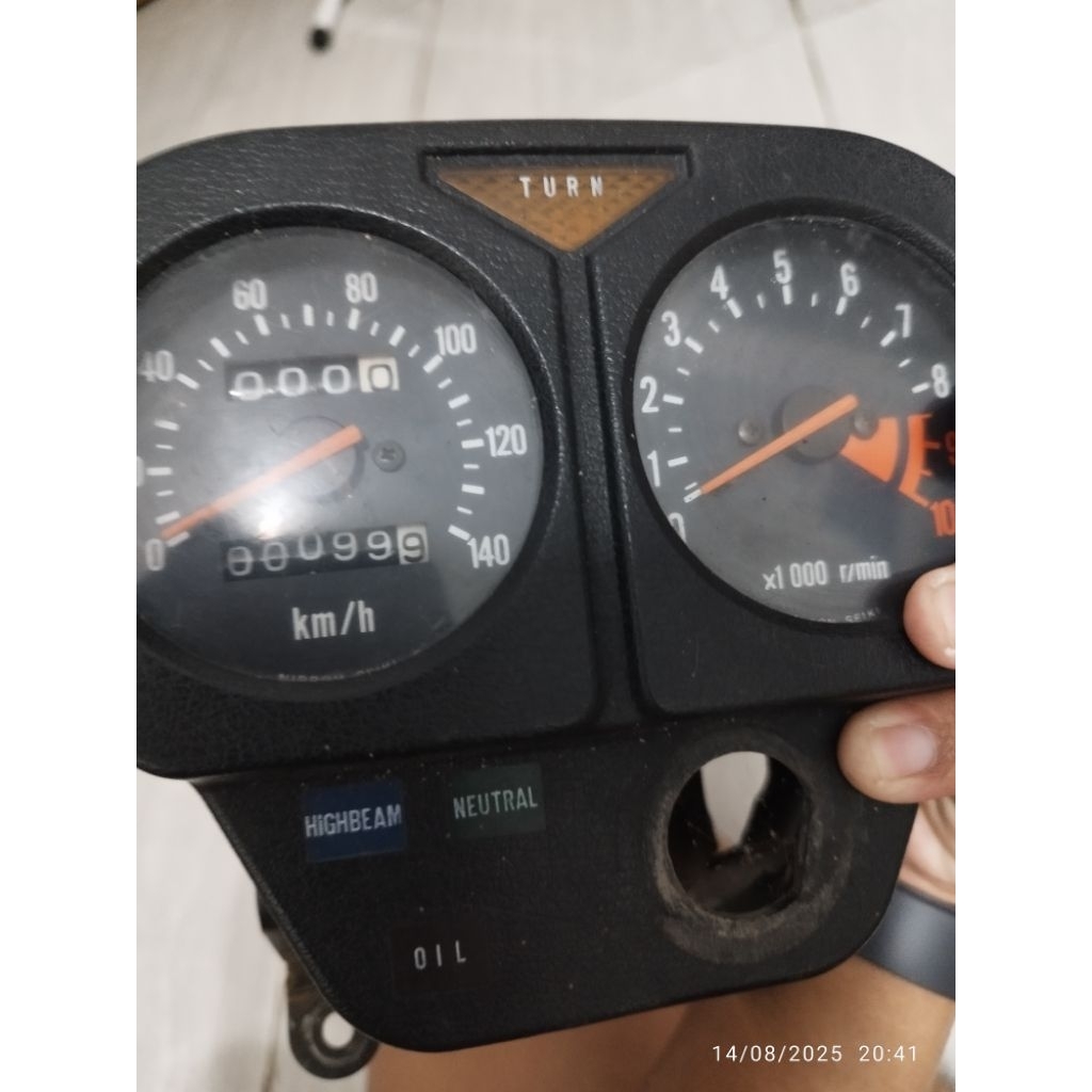 speedometer dan buku katalog part Suzuki TS 125