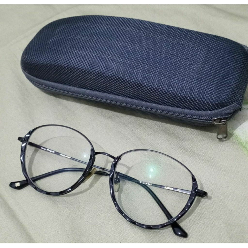 Kaca mata Optik Melawai