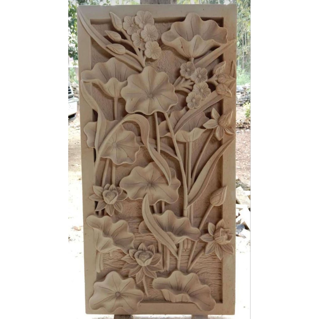 ukir batu alam relief bunga lotus