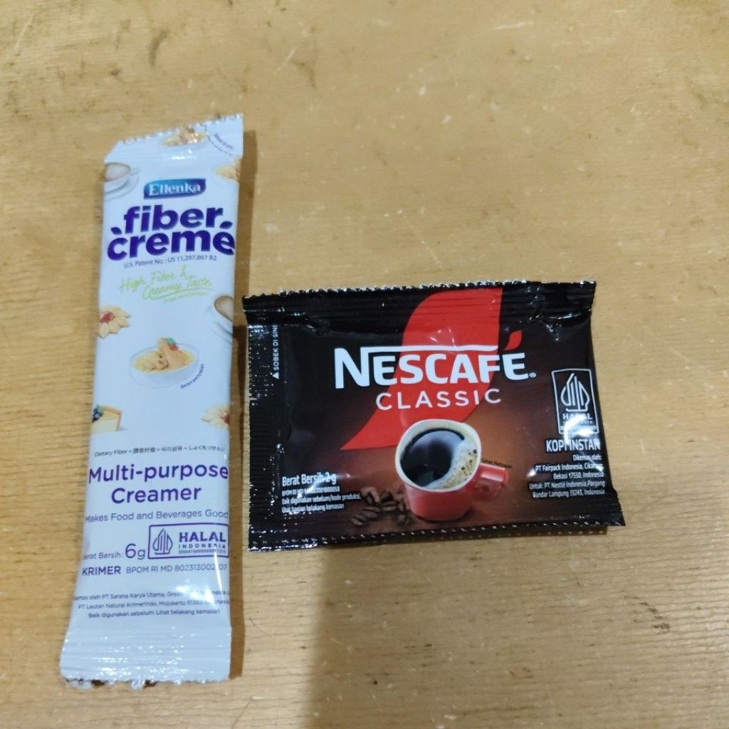 

kopi Nescafe 2 gram (1 sachet) + fiber creme 6 gram (1 sachet) kopi nikmat dan wangi