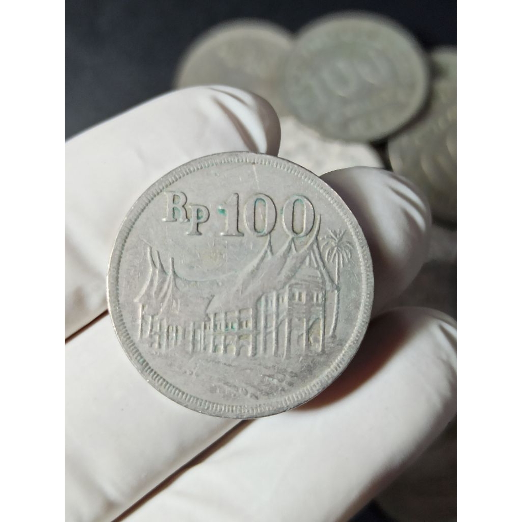 koin 100 rumah gadang tebal tahun 1973.