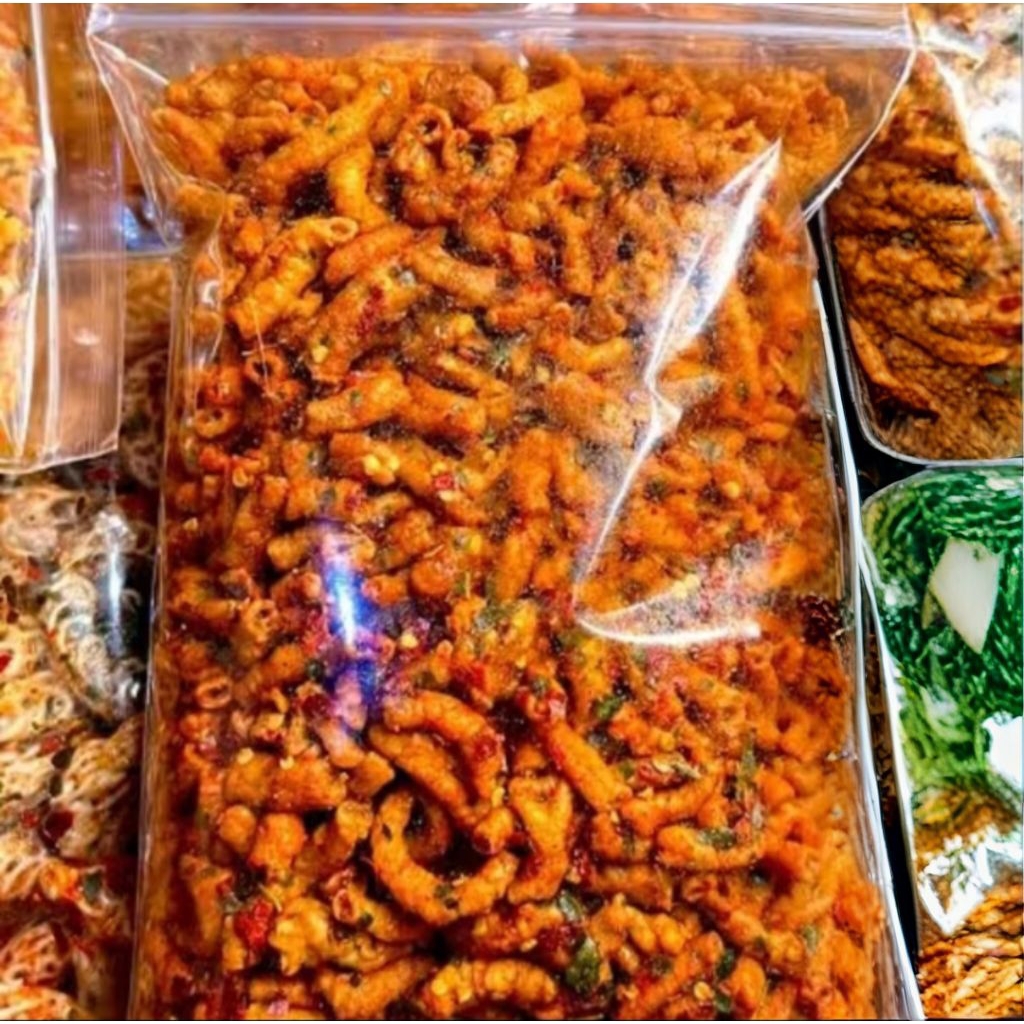 

KRIPIK USUS KRISPY PEDAS AROMA DAUN JERUK KEMASAN 100gram