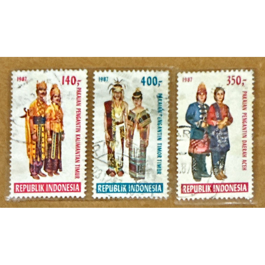 

(BA) PRANGKO INDONESIA 1987 PAKAIAN PENGANTIN DAERAH SERI -1 USED 3V COMPLIT SET.