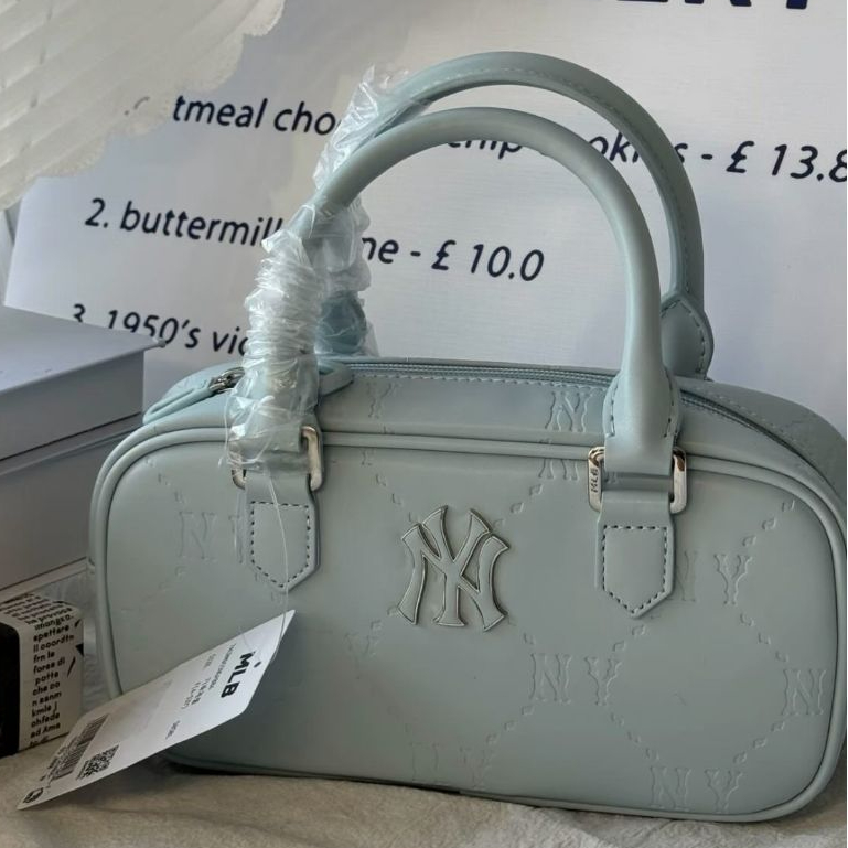 MLB NY Metal Monogram Embossed Leather Duffle Bag - Baby Blue