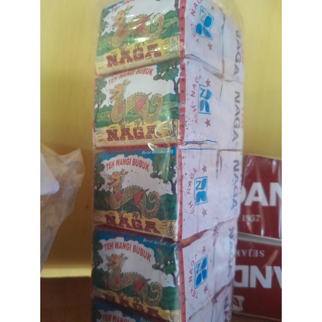 

Teh naga T cor kertas isi 10