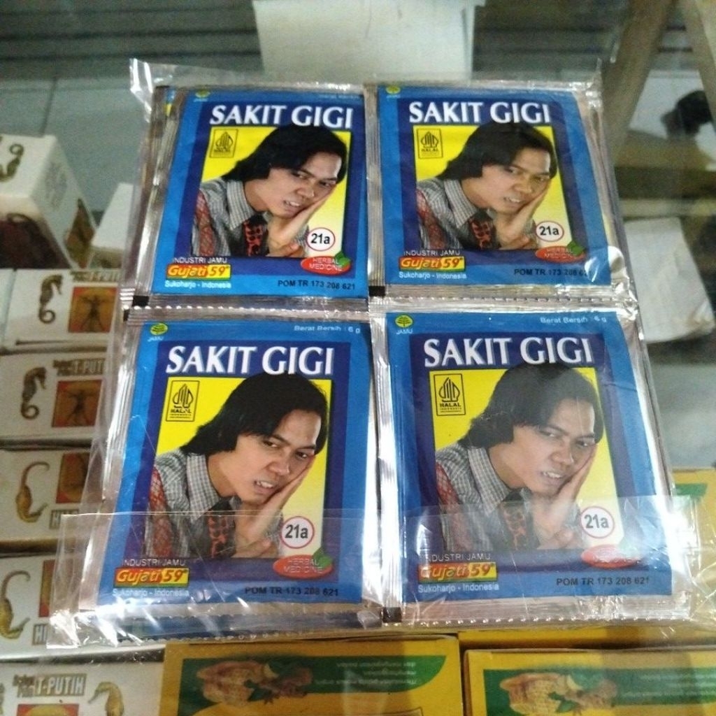 

jamu serbuk sakit gigi herbal Gujati59 1 slop isi 20 sachet
