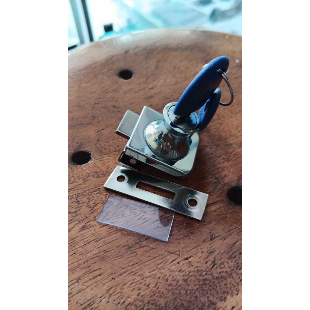 Kunci Kaca Lemari Etalase Jepit Single 407