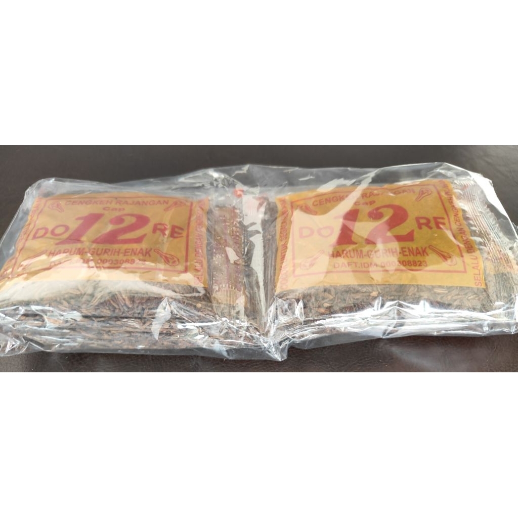 

Tjengkeh bumbu DORE Plastik kemasan 50