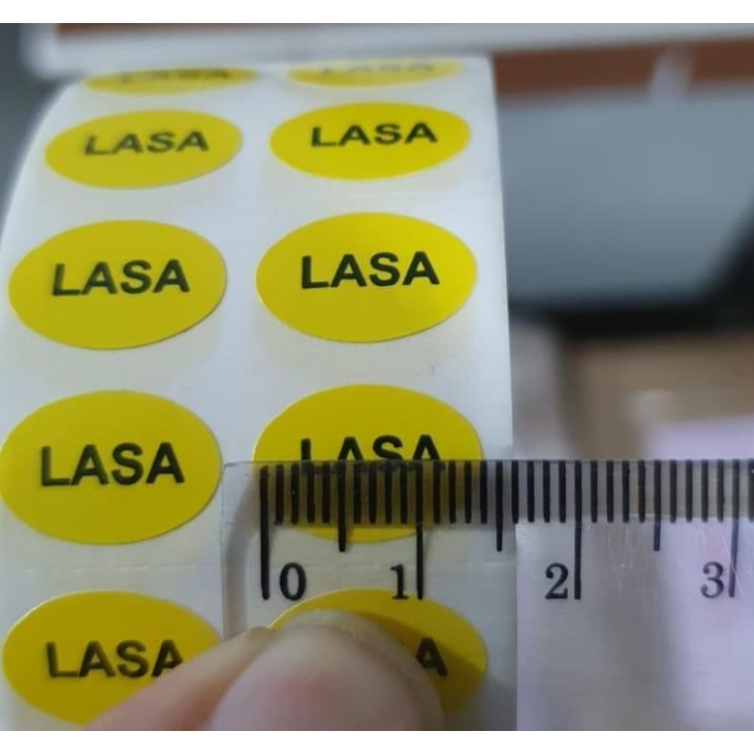 

STIKER LASA KUNING OVAL TULISAN HITAM 15X10mm isi 5000 pcs in ROLL