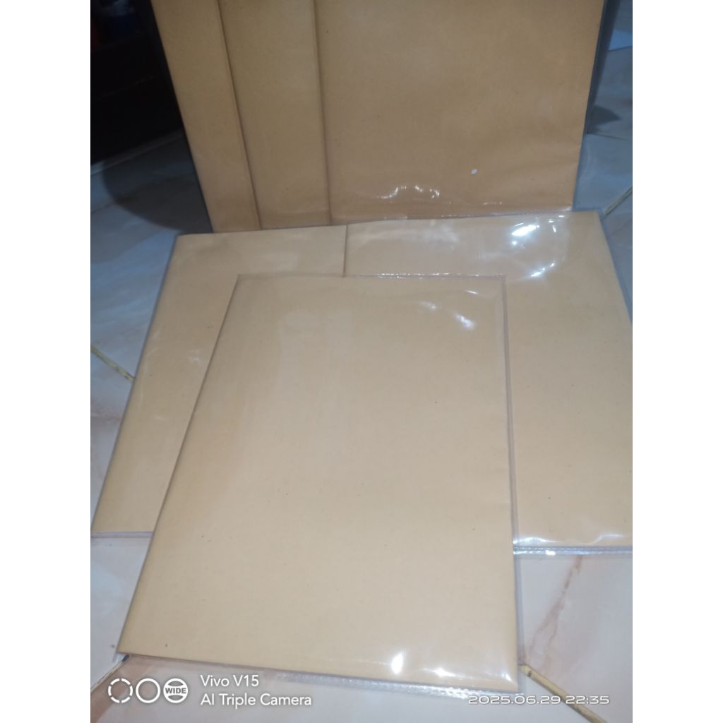 

Buku Tulis + Sampul Coklat (1 Pack Isi 10)