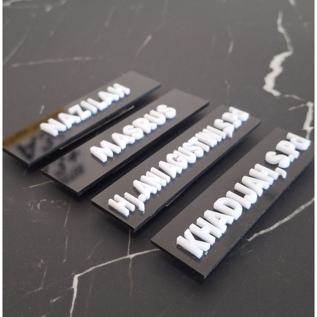 

Nama Dada Huruf Timbul