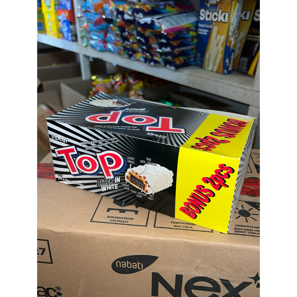 

TOP BLACK IN WHITE WHITE CHOCOLATE CARAMEL SMRICE CRISPIES BLACK WAFER CREAM