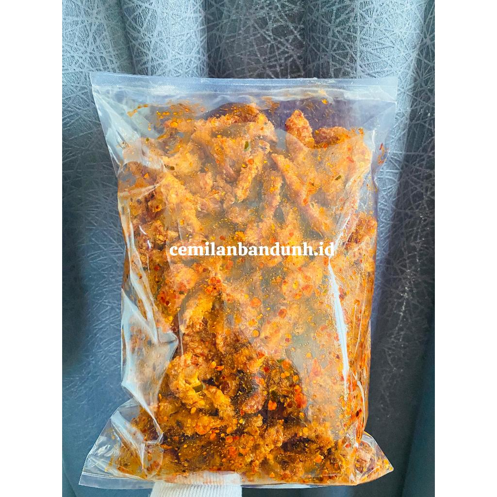 

KULIT AYAM CRISPY PEDAS DAUN JERUK KEMASAN 1KG 250GRAM 500GRAM