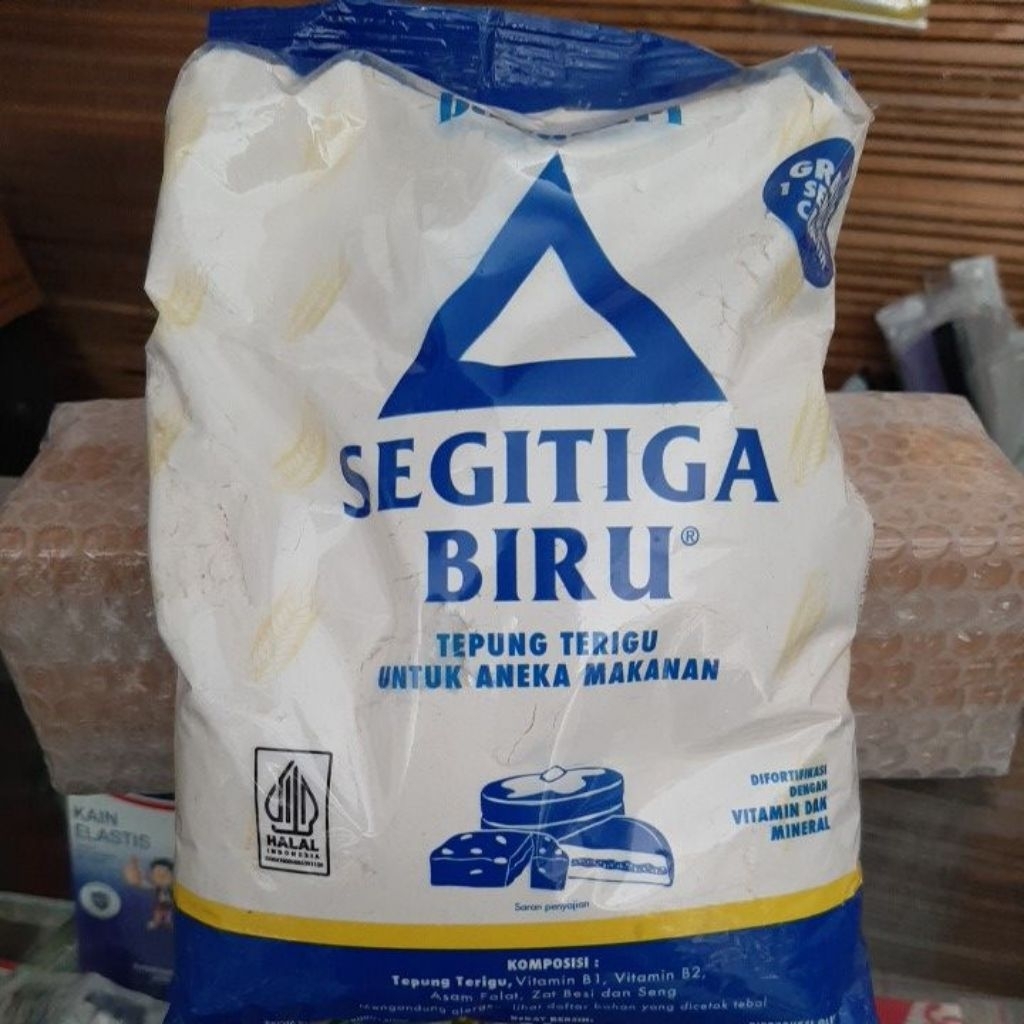 

TEPUNG TERIGU SEGITIGA BIRU LENCANA MERAH CAKRA KEMBAR REPACK