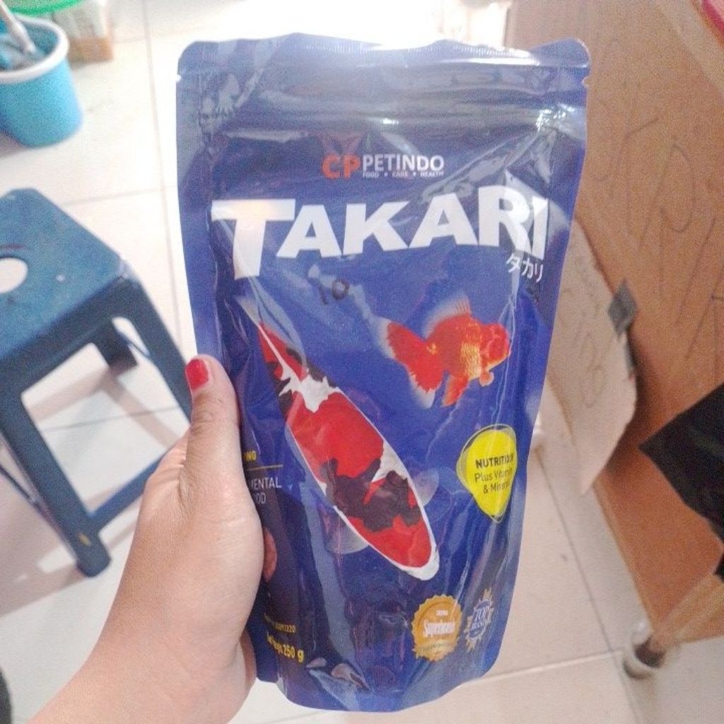 TAKARI MAKAN IKAN