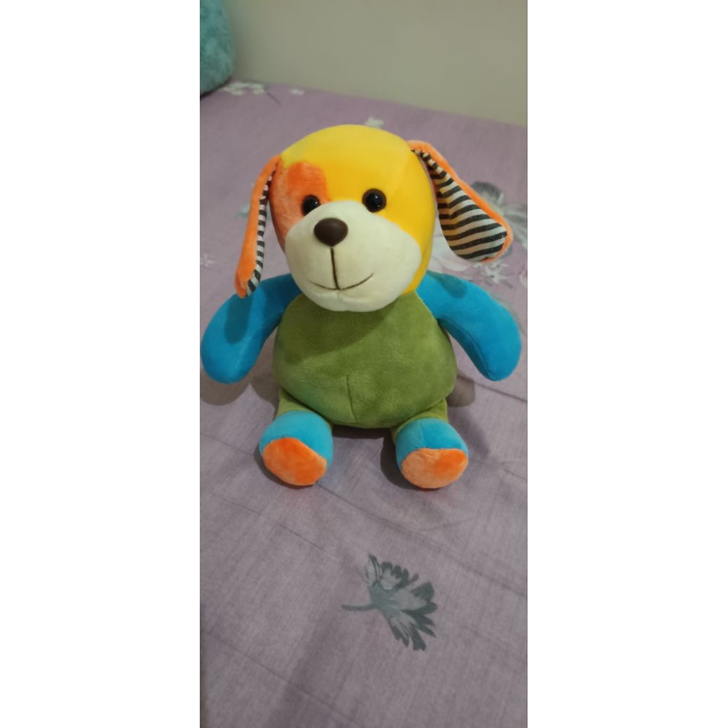 Boneka capit capit anjing